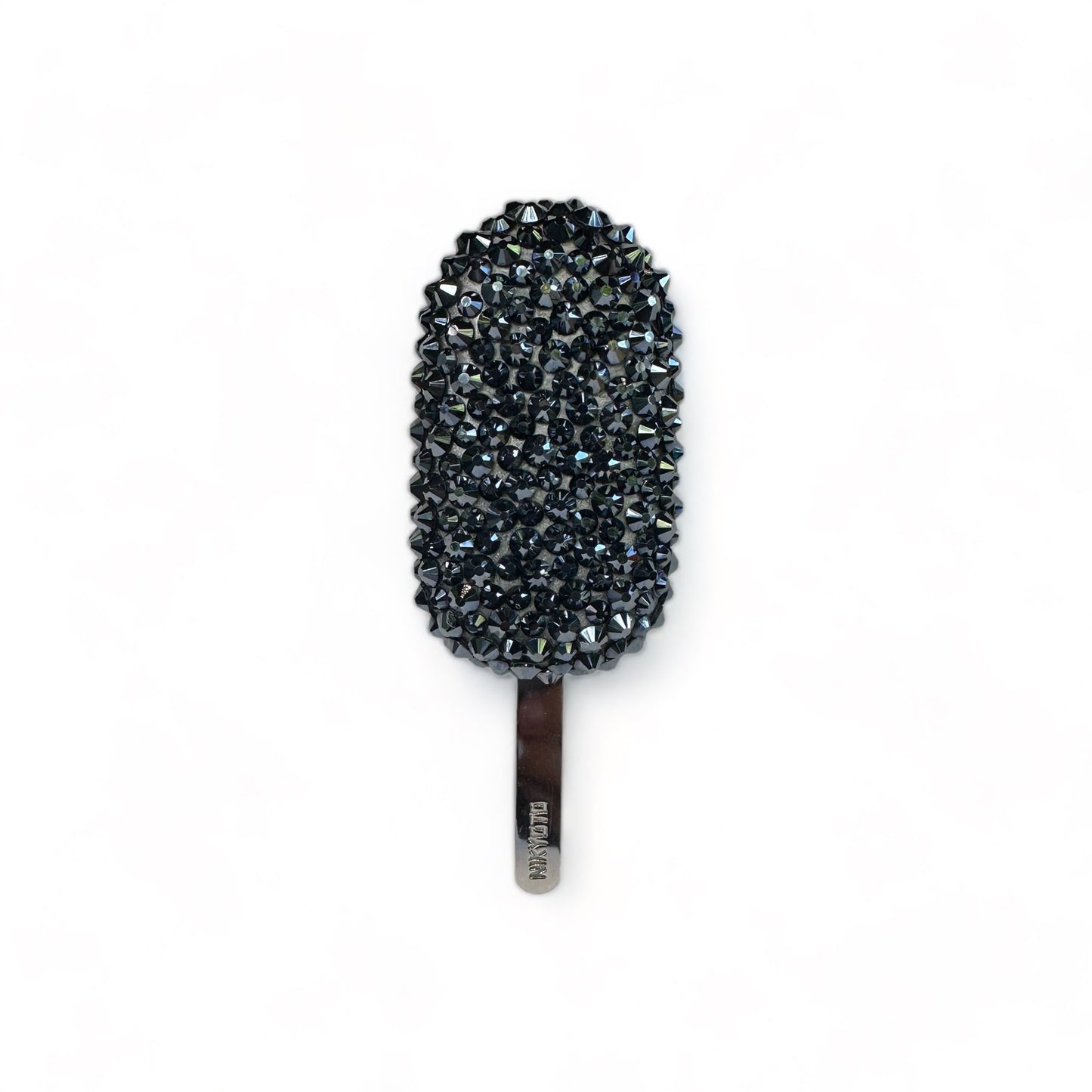 Carbon brooch
