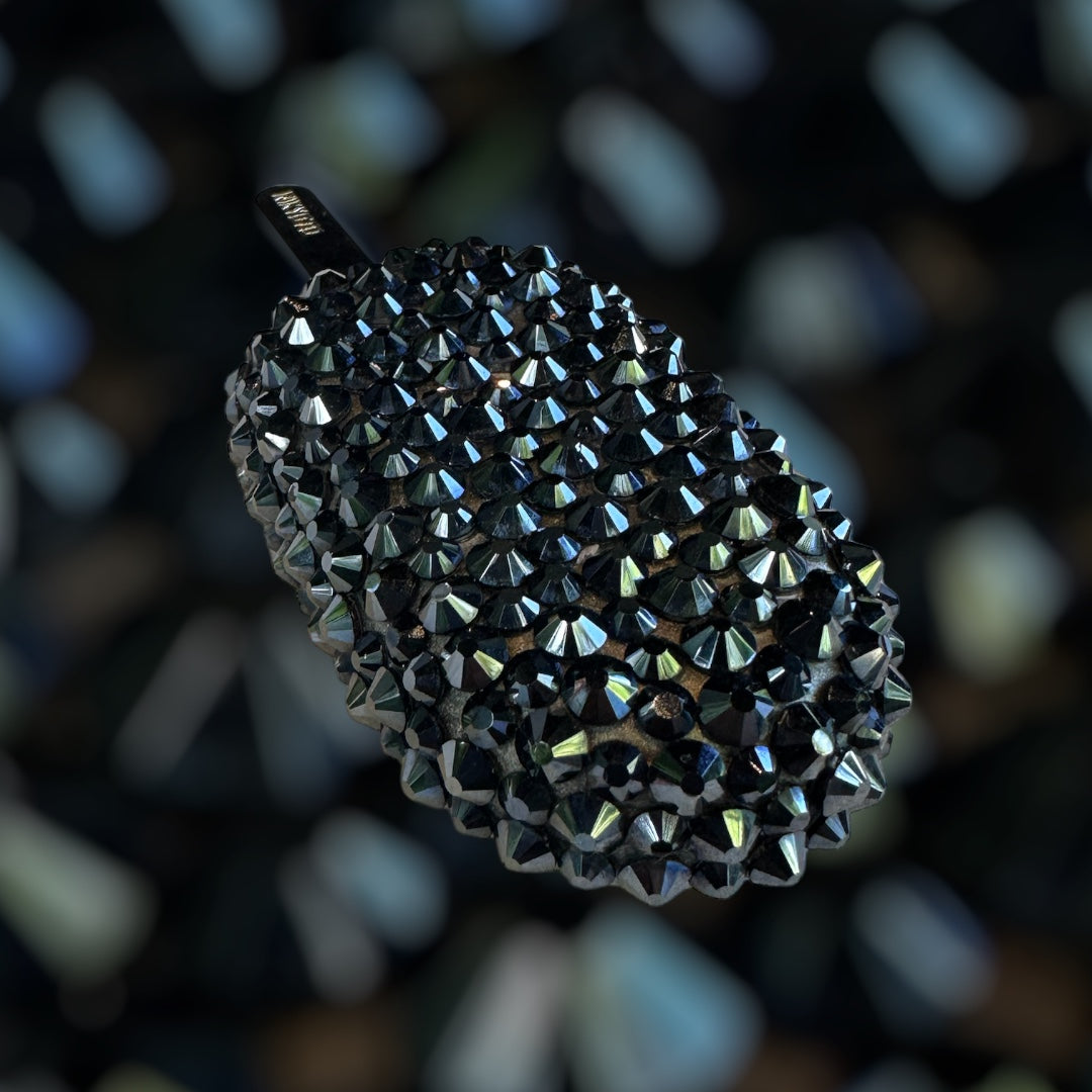 Carbon brooch