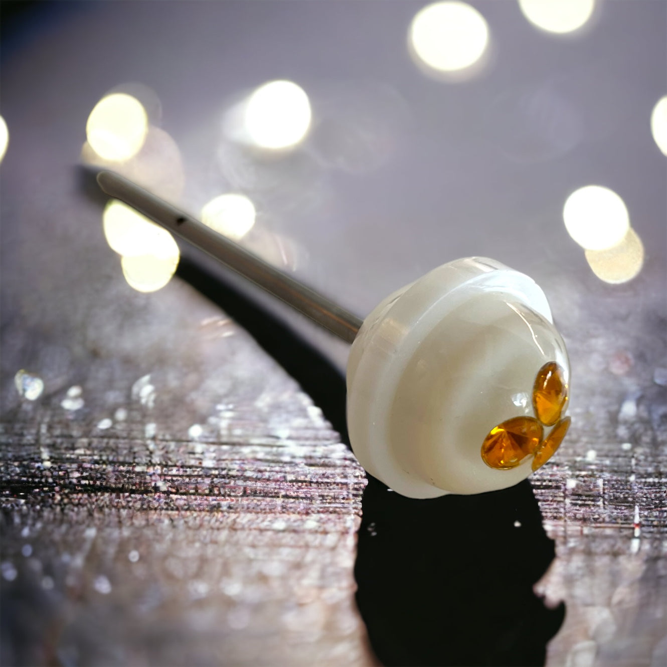 Pearl and stones lollipop